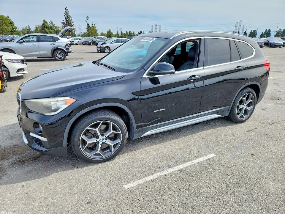 NORMAL WEAR damage on 2016 BMW X1 — salvage auction listing