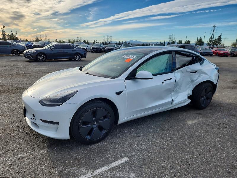 SIDE on 2021 TESLA MODEL 3 — salvage auction
