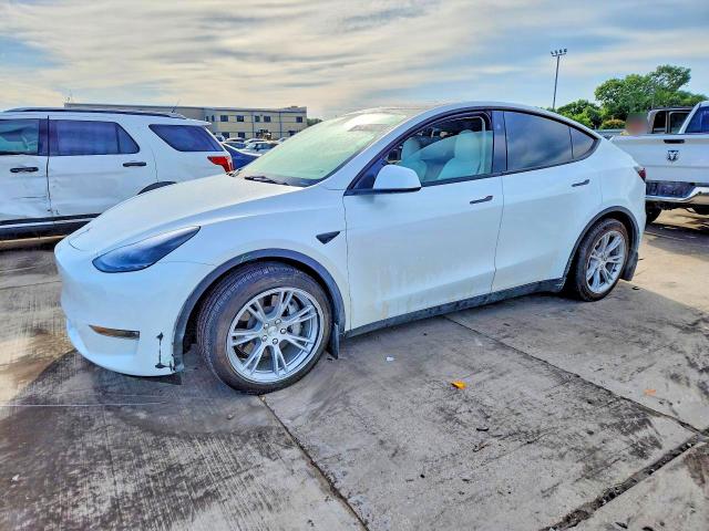 UNDERCARRIAGE damage on 2023 TESLA MODEL Y — salvage auction listing