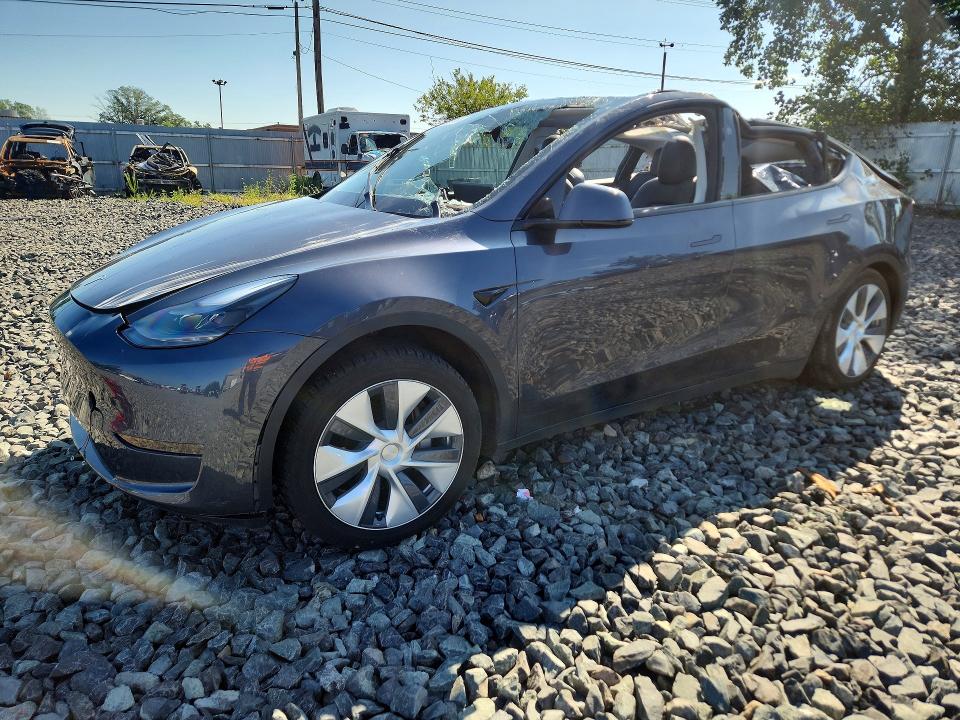 TOP/ROOF damage on 2023 TESLA MODEL Y — salvage auction listing